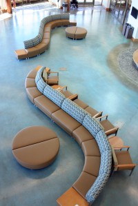 The lobby of the new, 52,000-square-foot Dena’Ina Wellness Center is meant to be an area for gathering and socializing, more than just a medical clinic reception lobby.